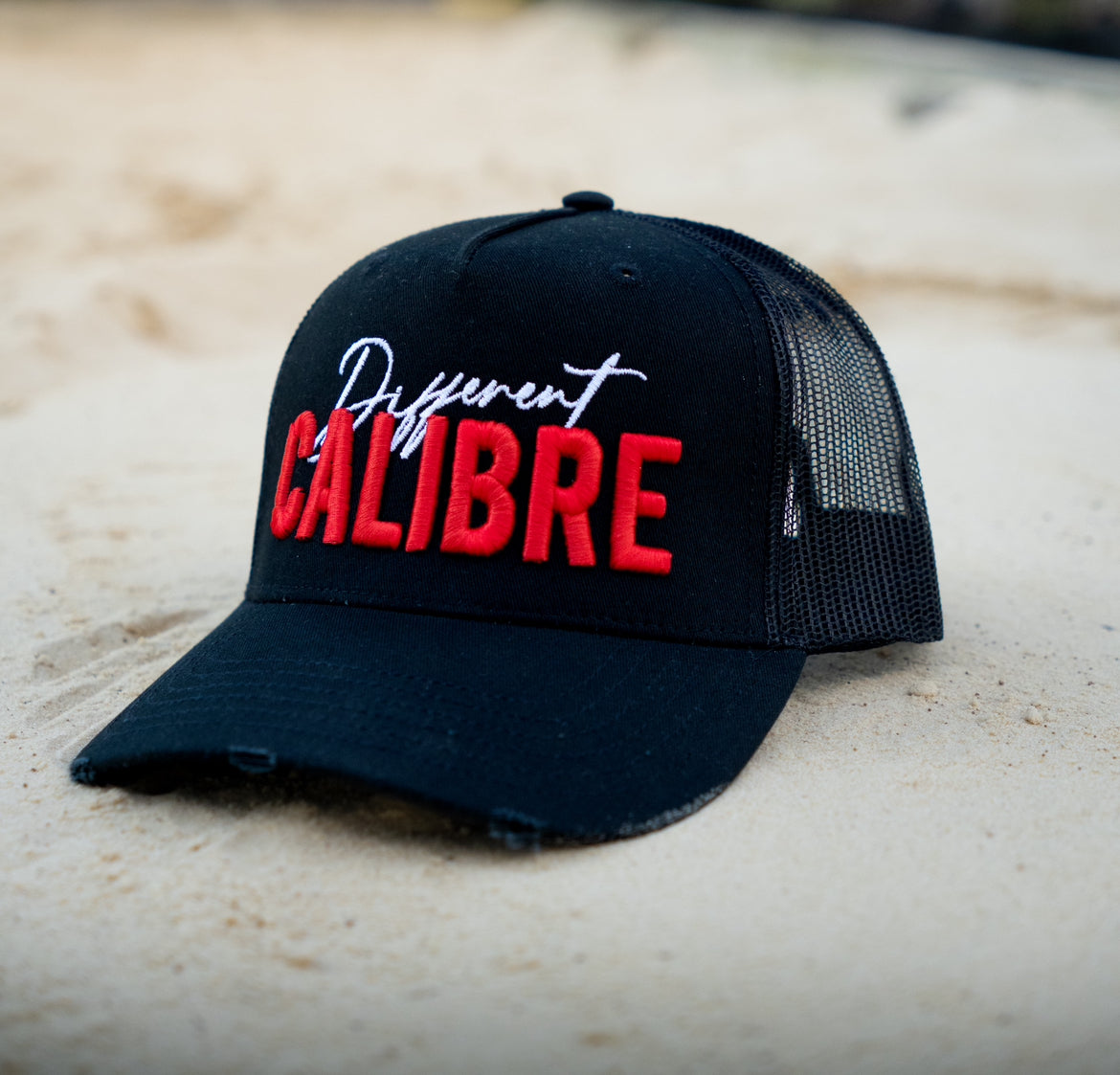 RED SIGNATURE BLACK MESH TRUCKER